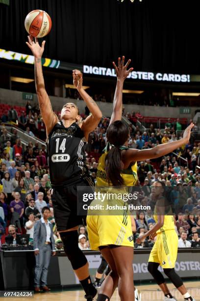 Erika de Souza of the San Antonio Stars goes to the basket against the Seattle Storm on June 18, 2017 at KeyArena in Seattle, Washington. NOTE TO...