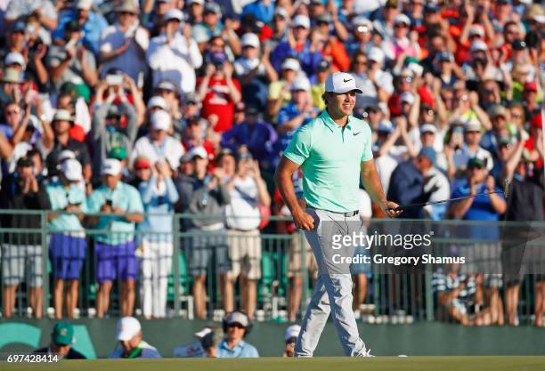 Brooks Koepka of the United States reacts after finishing on the 18th green during the final round of the 2017 U.S. Open at Erin Hills on June 18,...