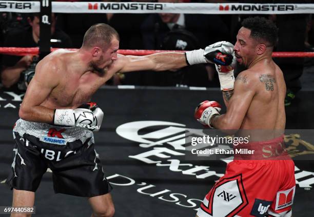 Sergey Kovalev throws a left at Andre Ward in the fifth round of their light heavyweight championship bout at the Mandalay Bay Events Center on June...