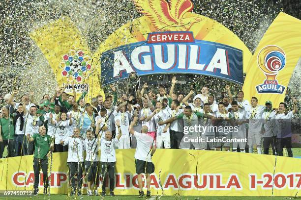 Players of Atletico Nacional lift the trophy to celebrate as champions of the Liga Aguila I 2017 after winning the Final second leg match between...