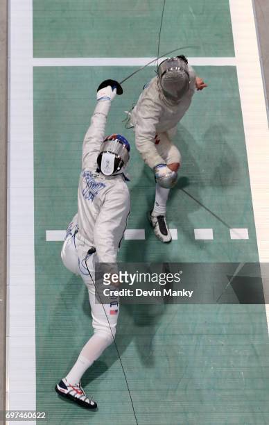 Eli Dershwitz of the USA fences Shaul Gordon of Canada during the gold medal match in the Team Men's Sabre event on June 18, 2017 at the Pan-American...