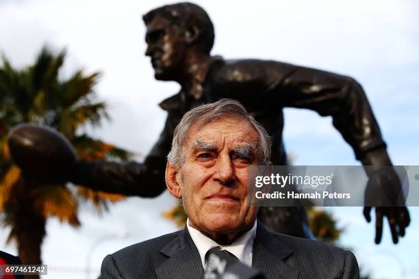 Former All Blacks player Sir Colin Meads is seen in front of a new statue of himself on June 19, 2017 in Te Kuiti, New Zealand. The 1.5 x life size...