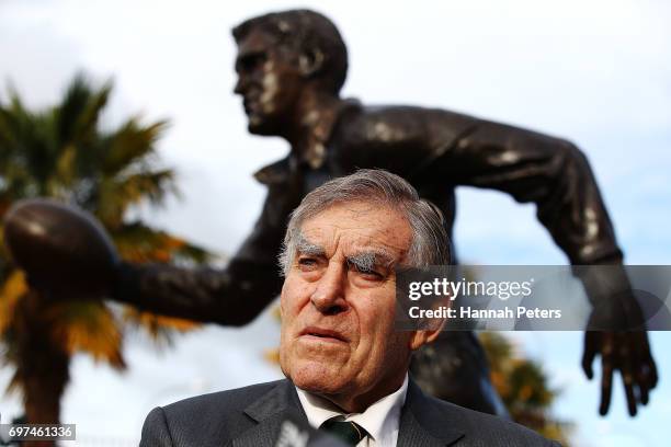 Former All Blacks player Sir Colin Meads is seen in front of a new statue of himself on June 19, 2017 in Te Kuiti, New Zealand. The 1.5 x life size...