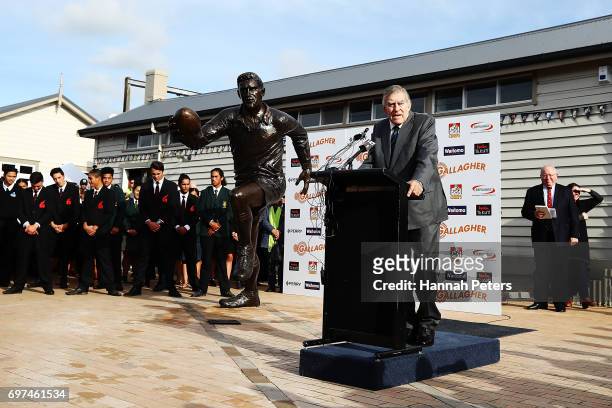 Former All Blacks player Sir Colin Meads speaks in front of a new statue of himself on June 19, 2017 in Te Kuiti, New Zealand. The 1.5 x life size...