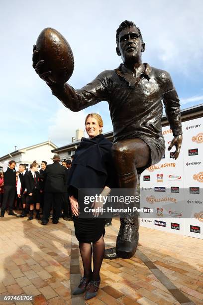 Artist Natalie Stamilla is seen in front of her sculpture on June 19, 2017 in Te Kuiti, New Zealand. The 1.5 x life size bronze sculpture is of Sir...