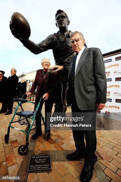 Former All Blacks player Sir Colin Meads and his wife Lady Verna are seen in front of a new statue of himself on June 19, 2017 in Te Kuiti, New...