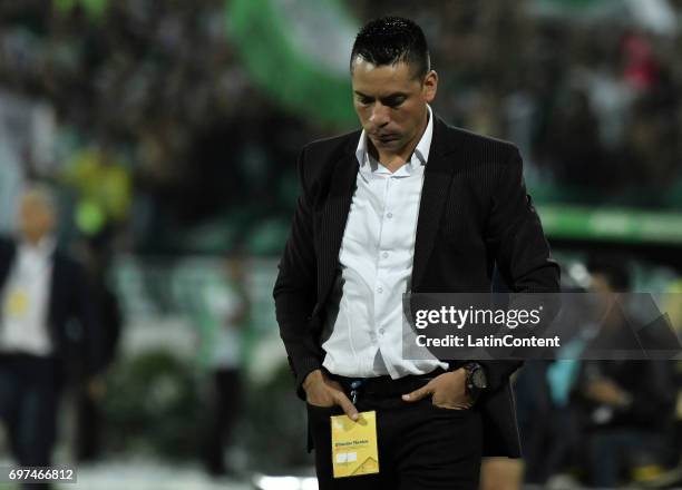 Hector Cardenas coach of Deportivo Cali looks dejected during the Final second leg match between Atletico Nacional and Deportivo Cali as part of Liga...