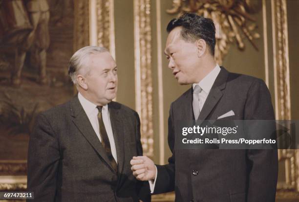 Prime Minister of the United Kingdom Harold Wilson on left, talks with Prime Minister of Singapore Lee Kuan Yew at the 1969 Commonwealth Prime...