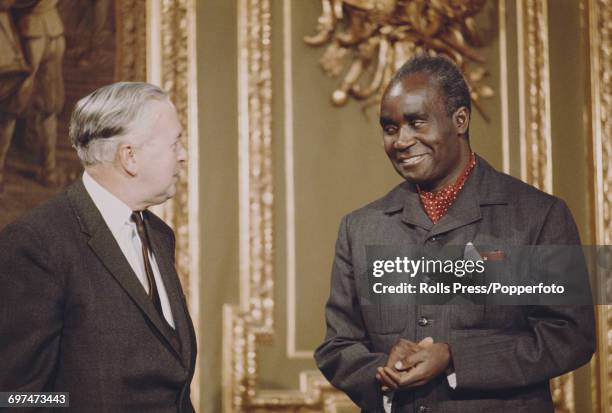 Prime Minister of the United Kingdom Harold Wilson on left, talks with President of Zambia Kenneth Kaunda at the 1969 Commonwealth Prime Ministers'...