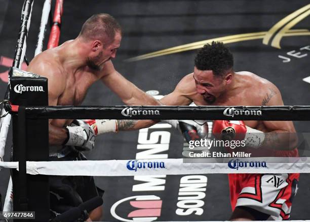 Andre Ward hits Sergey Kovalev with a right in the eighth round of their light heavyweight championship bout at the Mandalay Bay Events Center on...