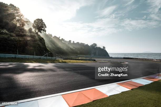 the motor racing track - motori sport foto e immagini stock