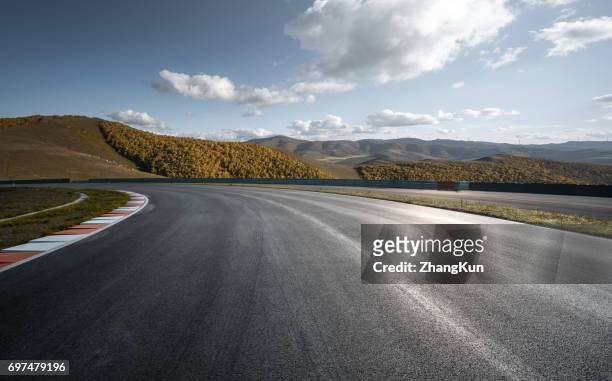 the motor racing track - モータースポーツ ストックフォトと画像