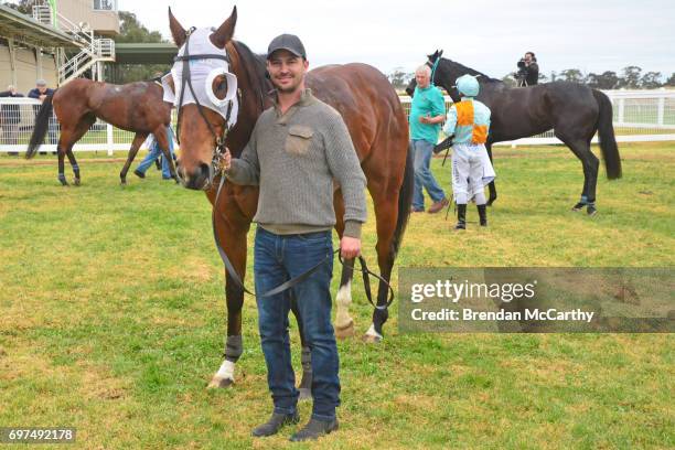 Attack the Line and Brent Stanley after winning the Mogas Regional BM58 Handicap at Donald Racecourse on June 19, 2017 in Donald, Australia.