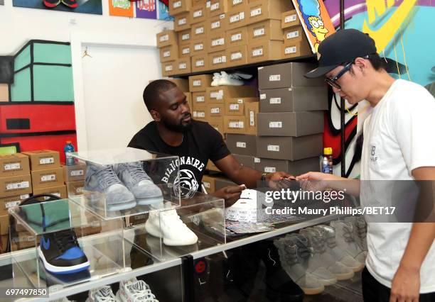 Jason Sim and Roland Reaves attend BETX Pop Up at Cool Kicks on June 18, 2017 in Los Angeles, California.