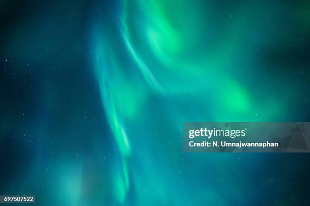 aurora borealis during the night in iceland - aurora stock pictures, royalty-free photos & images