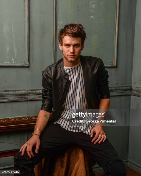 Brandon Flynn poses for a portrait at the 2017 iHeartRADIO MuchMusic Video Awards at MuchMusic HQ on June 18, 2017 in Toronto, Canada.