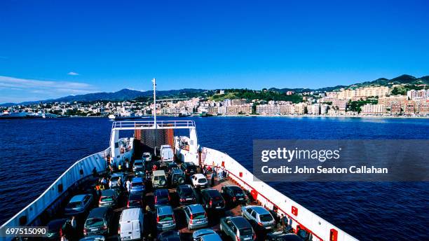 crossing the strait of messina - straße von messina stock-fotos und bilder