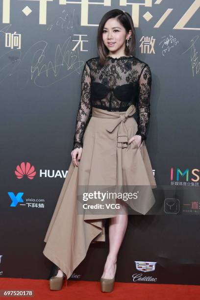 Singer G.E.M. Poses at the red carpet of 2017 Sina Weibo Film Night on June 18, 2017 in Shanghai, China.