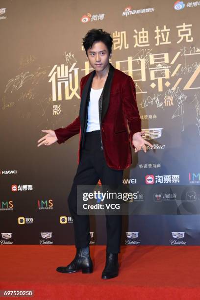 Actor Deng Chao poses at the red carpet of 2017 Sina Weibo Film Night on June 18, 2017 in Shanghai, China.