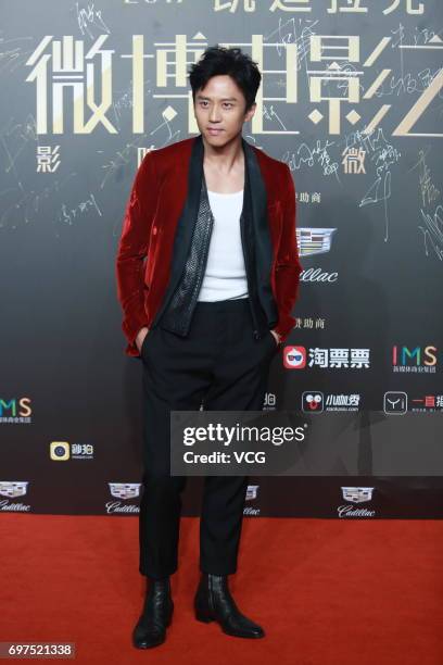 Actor Deng Chao poses at the red carpet of 2017 Sina Weibo Film Night on June 18, 2017 in Shanghai, China.