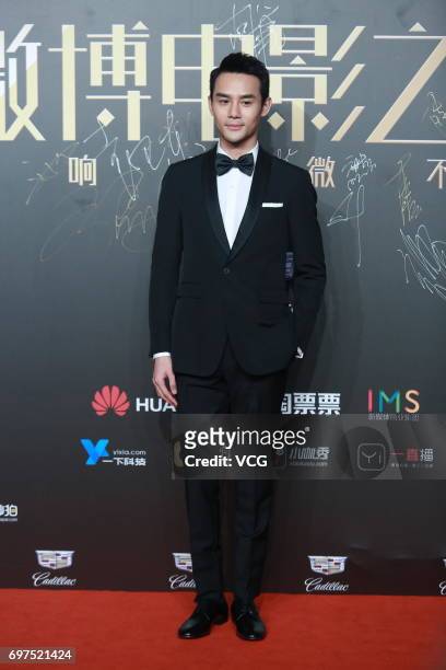 Actor Wang Kai poses at the red carpet of 2017 Sina Weibo Film Night on June 18, 2017 in Shanghai, China.
