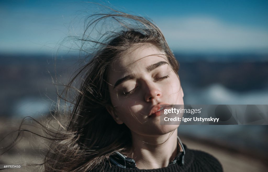 Portrait of woman in mountains