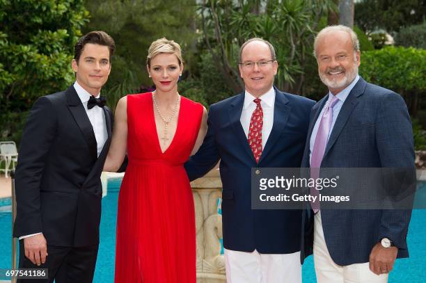 In this handout image provided by Le Palais Princier, Matthew Bomer,Princess Charlene of Monaco,Prince Albert II of Monaco and Kelsey Grammer attend...