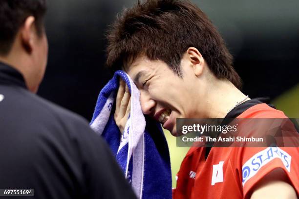 Jun Mizutani of Japan reacts during the men's singles semi final match against Zhendong Fan of China on day five of the 2017 ITTF World Tour Platinum...