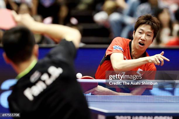 Jun Mizutani of Japan competes during the men's singles semi final match against Zhendong Fan of China on day five of the 2017 ITTF World Tour...