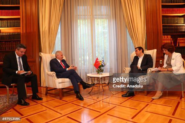 Prime Minister of Turkey Binali Yildirim speaks with Prime Minister of Greece Alexis Tsipras during their meeting, in Athens, Greece on June 19, 2017.