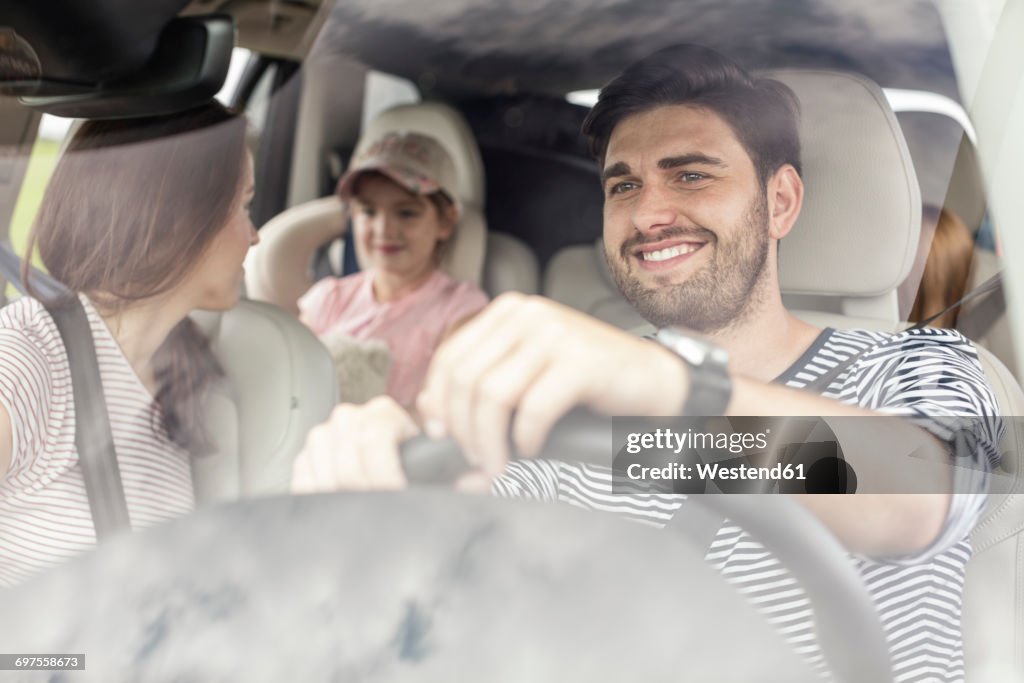 Happy family doing a road trip