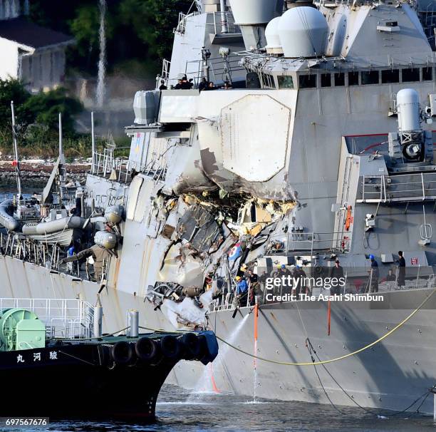 Fitzgerald arrives at Yokosuka Port after a collision with container ship off Shimoda on June 17, 2017 in Yokosuka, Kanagawa, Japan. Seven U.S. Navy...