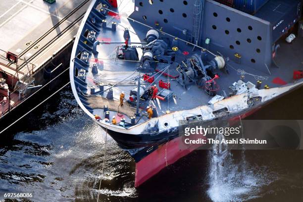 Container ship ACX Crystal is seen at Oi Pier after a collision with USS Fitzgerald off Shimoda on June 17, 2017 in Tokyo, Japan. Seven U.S. Navy...