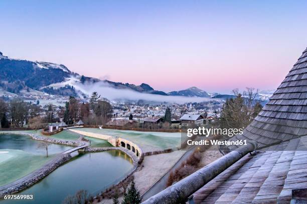 austria, tyrol, kitzbuehel, view to the city at morning twilight - kitzbuhel stock pictures, royalty-free photos & images