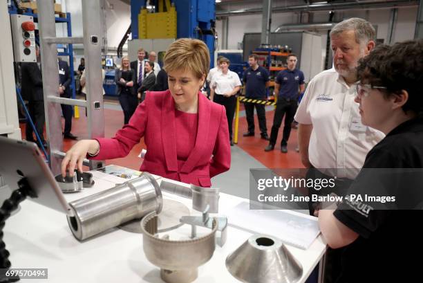 First Minister Nicola Sturgeon meets engineers during a visit to the Advanced Forming Research Centre in Renfrew where she took a tour of the...