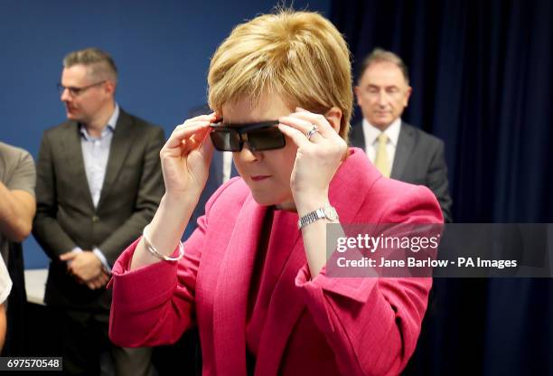 First Minister Nicola Sturgeon looks at a 3D simulator during a visit to the Advanced Forming Research Centre in Renfrew where she took a tour of the...