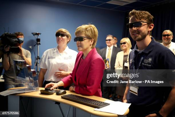 First Minister Nicola Sturgeon looks at a 3D simulator during a visit to the Advanced Forming Research Centre in Renfrew where she took a tour of the...