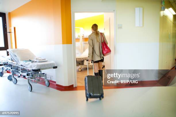 hospital coming - coming back stock pictures, royalty-free photos & images