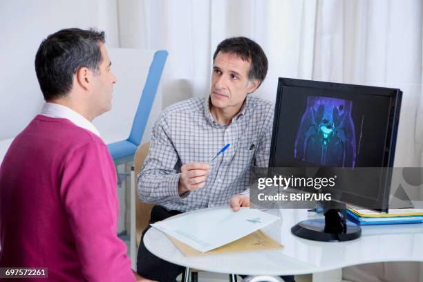 urology consultation man - urologist stock pictures, royalty-free photos & images