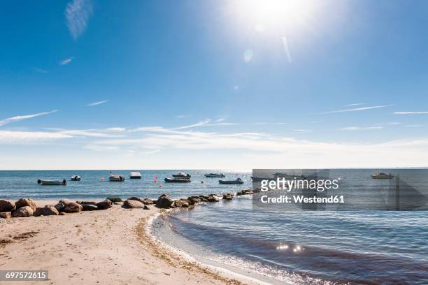 germany, schleswig-holstein, moored motorboats on baltic sea - travemuende stock pictures, royalty-free photos & images