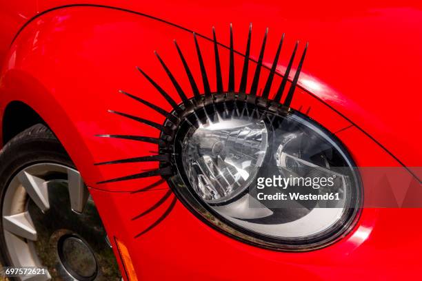 headlight with eyelashes, close-up - extreme close up stock-fotos und bilder