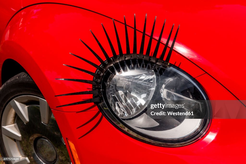 Headlight with eyelashes, close-up