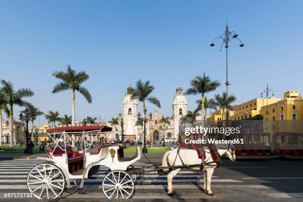 peru, lima, plaza de armas, cathedral of lima and carriage - lima peru stock pictures, royalty-free photos & images