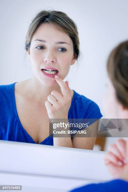 woman with a toothache - gingivitis stock pictures, royalty-free photos & images