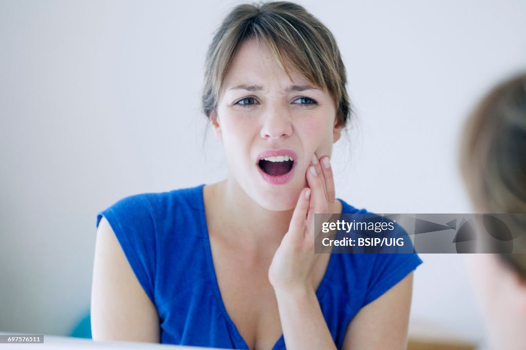 Woman with a toothache