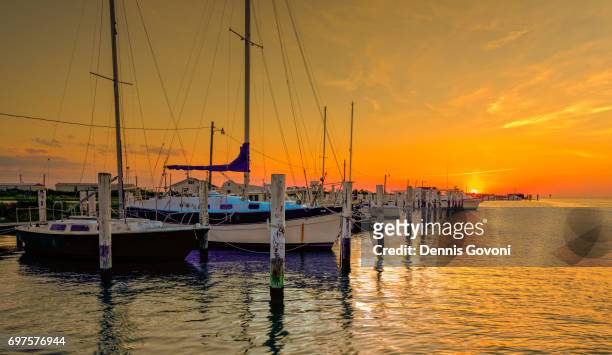 sunset at the marina - chesapeake bay stock pictures, royalty-free photos & images