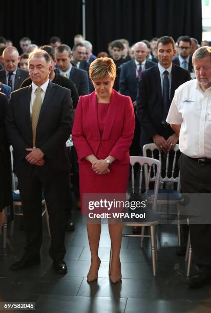 First Minister Nicola Sturgeon observes a minute's silence during a visit to the Advanced Forming Research Centre in Renfrew, Glasgow, in memory of...