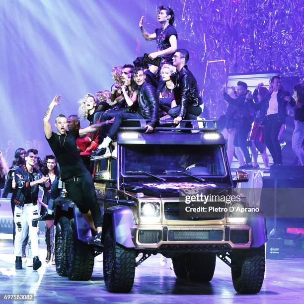 Philipp Plein and models aknowledge the applause of the audience at the Philipp Plein show during Milan Men's Fashion Week Spring/Summer 2018 on June...