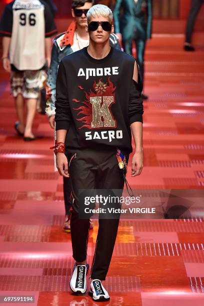 Model walks the runway at the Dolce & Gabbana show during Milan Men's Fashion Week Spring/Summer 2018 on June 17, 2017 in Milan, Italy.