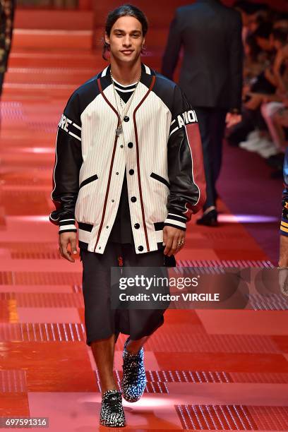 Pablo Morais walks the runway at the Dolce & Gabbana show during Milan Men's Fashion Week Spring/Summer 2018 on June 17, 2017 in Milan, Italy.